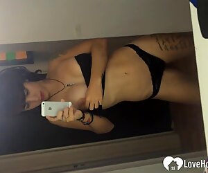 Horny stepdaughter records herself in the bathroom