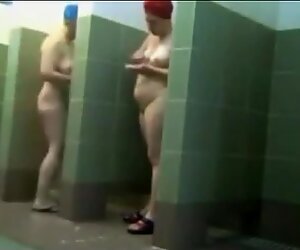 Mature moms showering after swimming