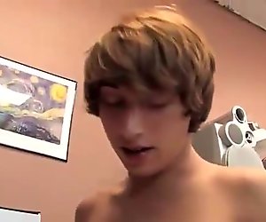 Young cute twink lads having passionate sex on the bed