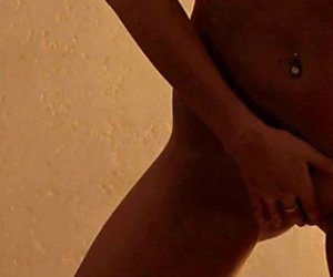 Naked blonde half light masturbation