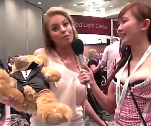 Britney Amber demonstrates Teddy Love Bear to Harriet Sugarcookie AVN 2015
